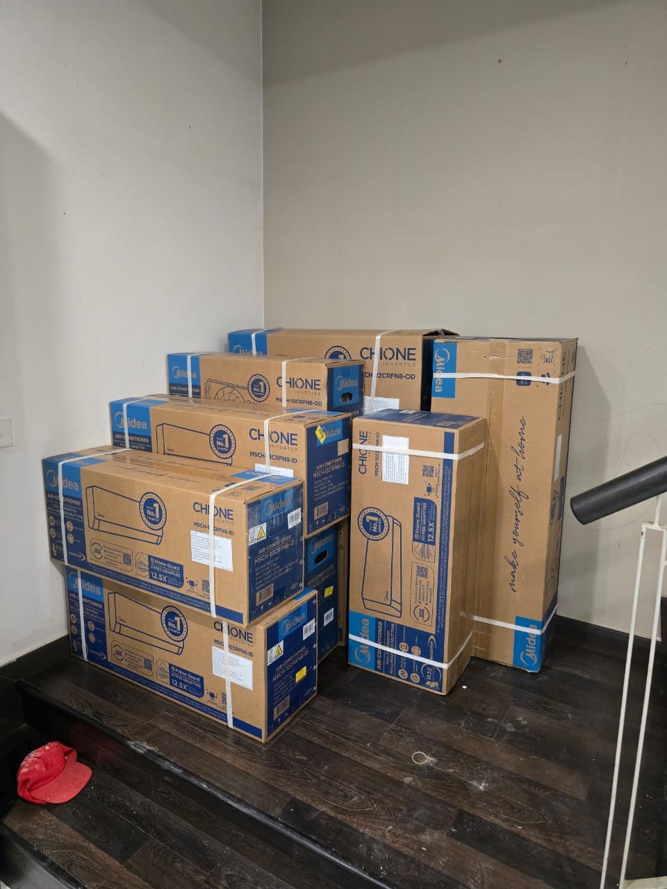 New split aircond delivered in manufacturer packing, RumahPro Malaysia supply and install