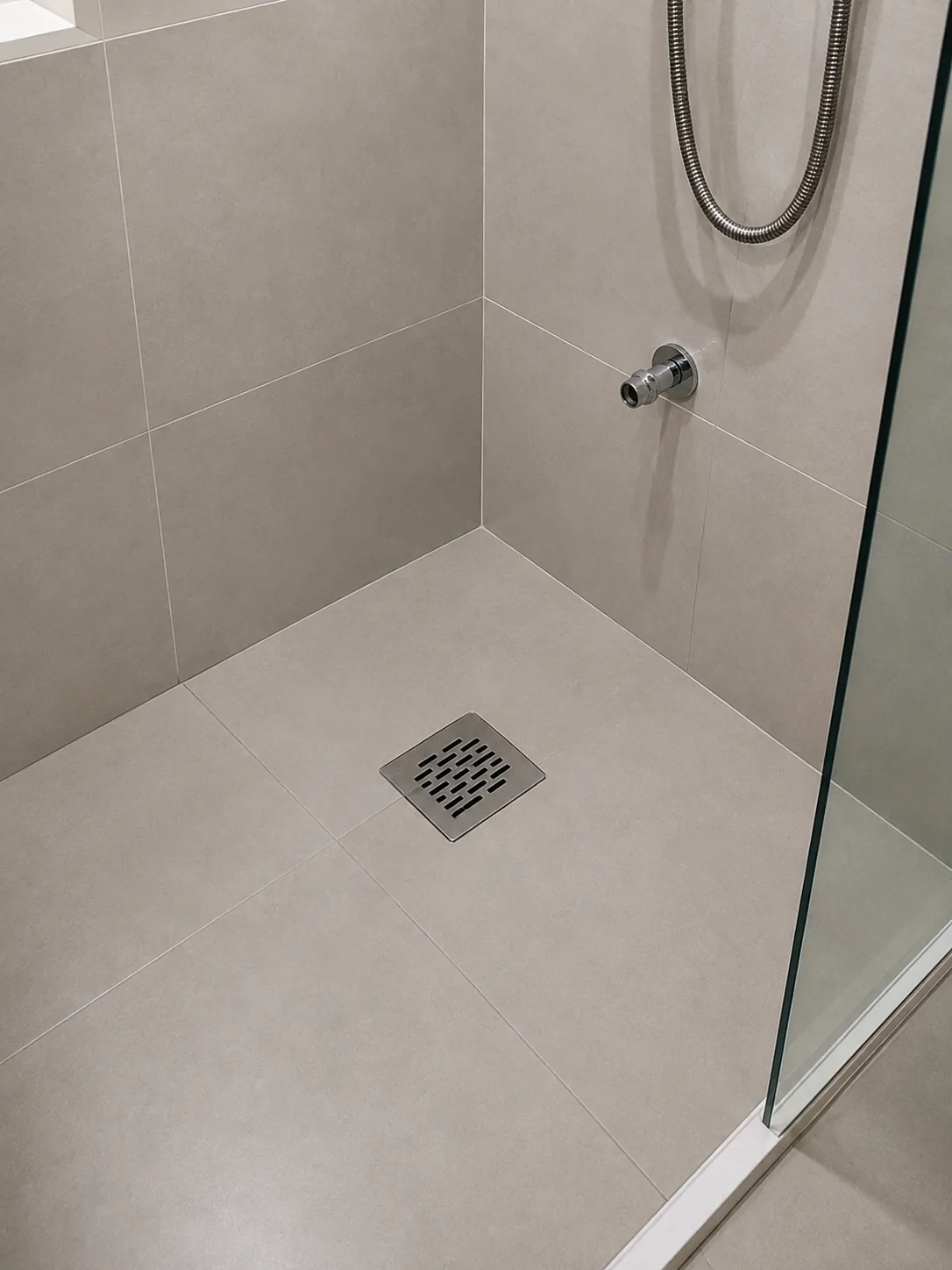 Bathroom floor drain installation with correct fall by RumahPro Malaysia plumber