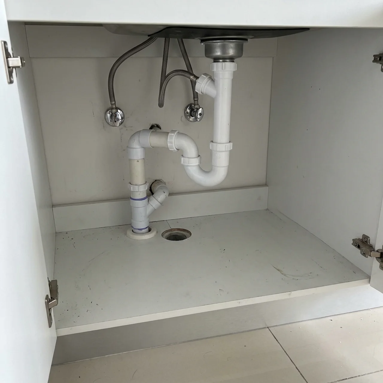 Kitchen sink drain plumbing work by RumahPro Malaysia certified plumber