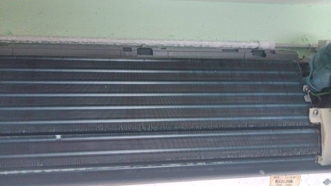 Aircond service work in progress by RumahPro Malaysia team