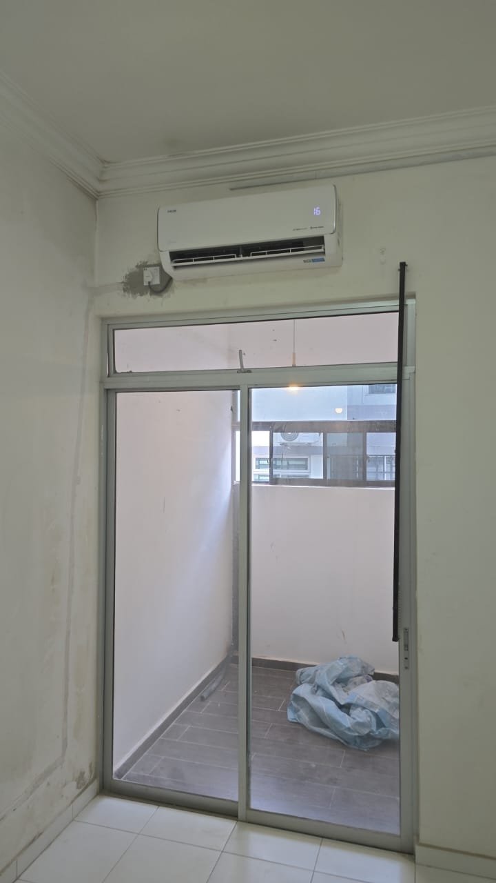 Wall-mounted split aircond installed by RumahPro Malaysia team